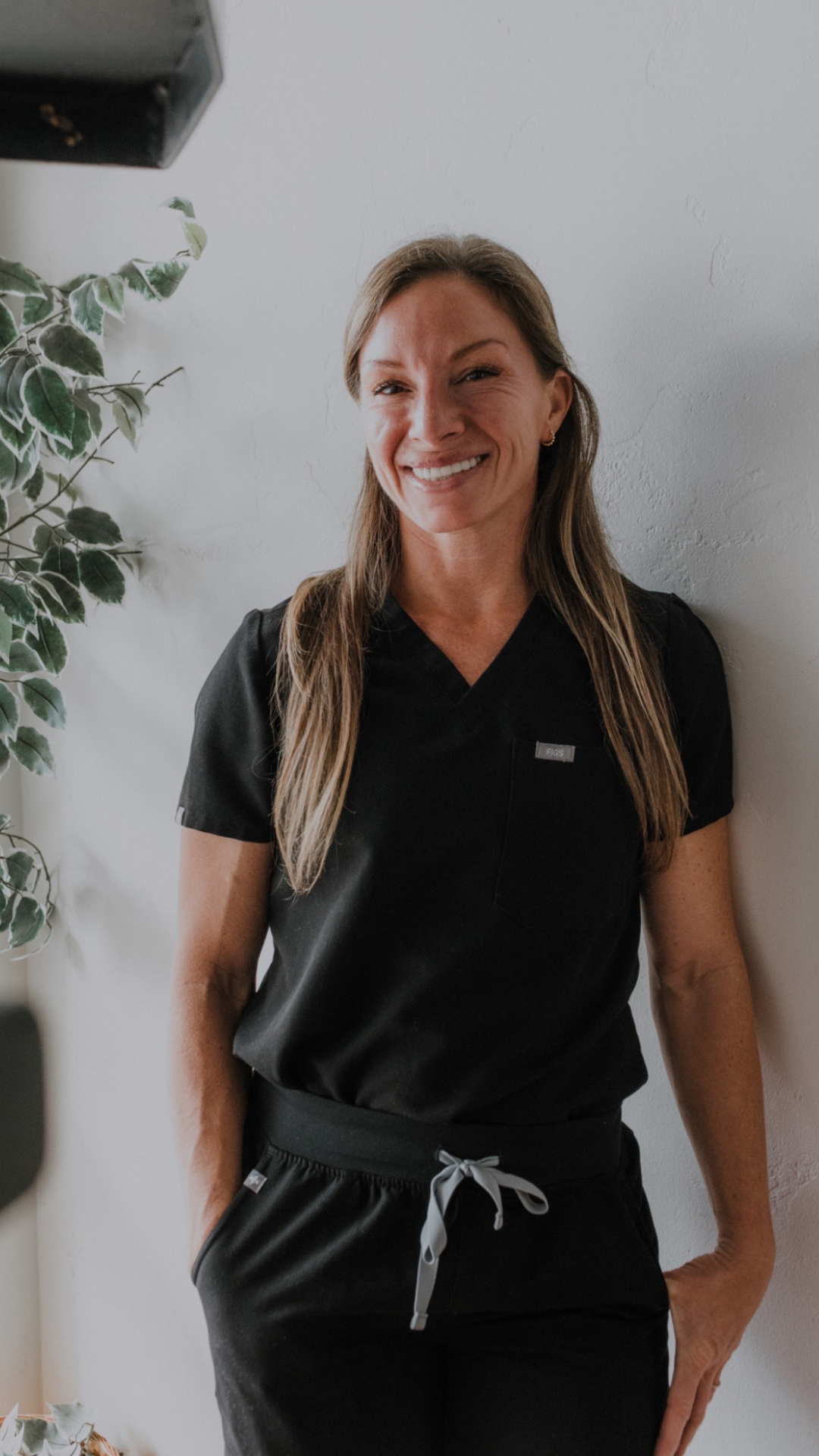 Erica Santana, BSN, RN, CEN — founder of FloState Wellness + Aesthetics